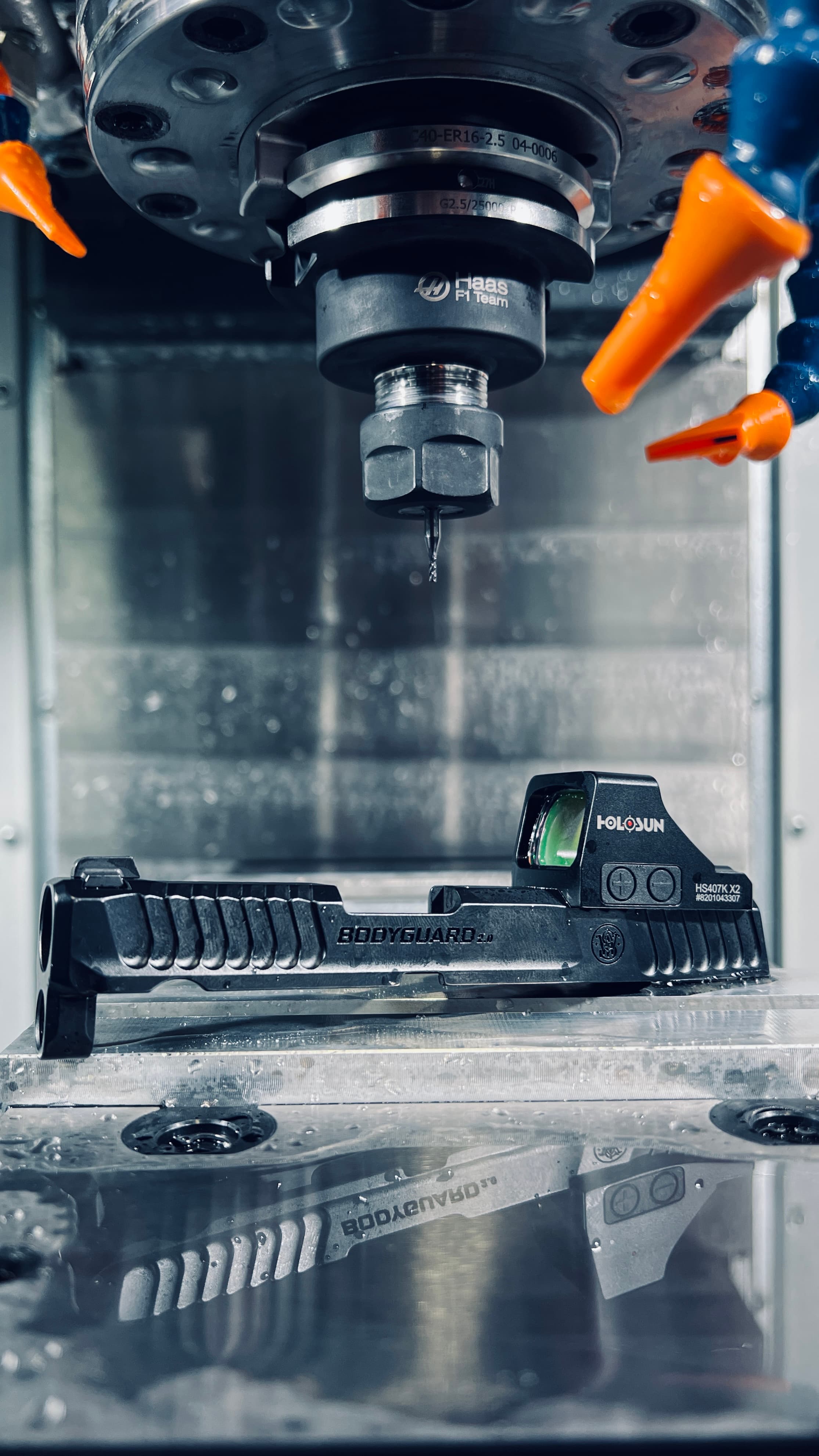 CNC machine cutting optic mount on Smith & Wesson Bodyguard slide with Holosun red dot - 365 Weapons