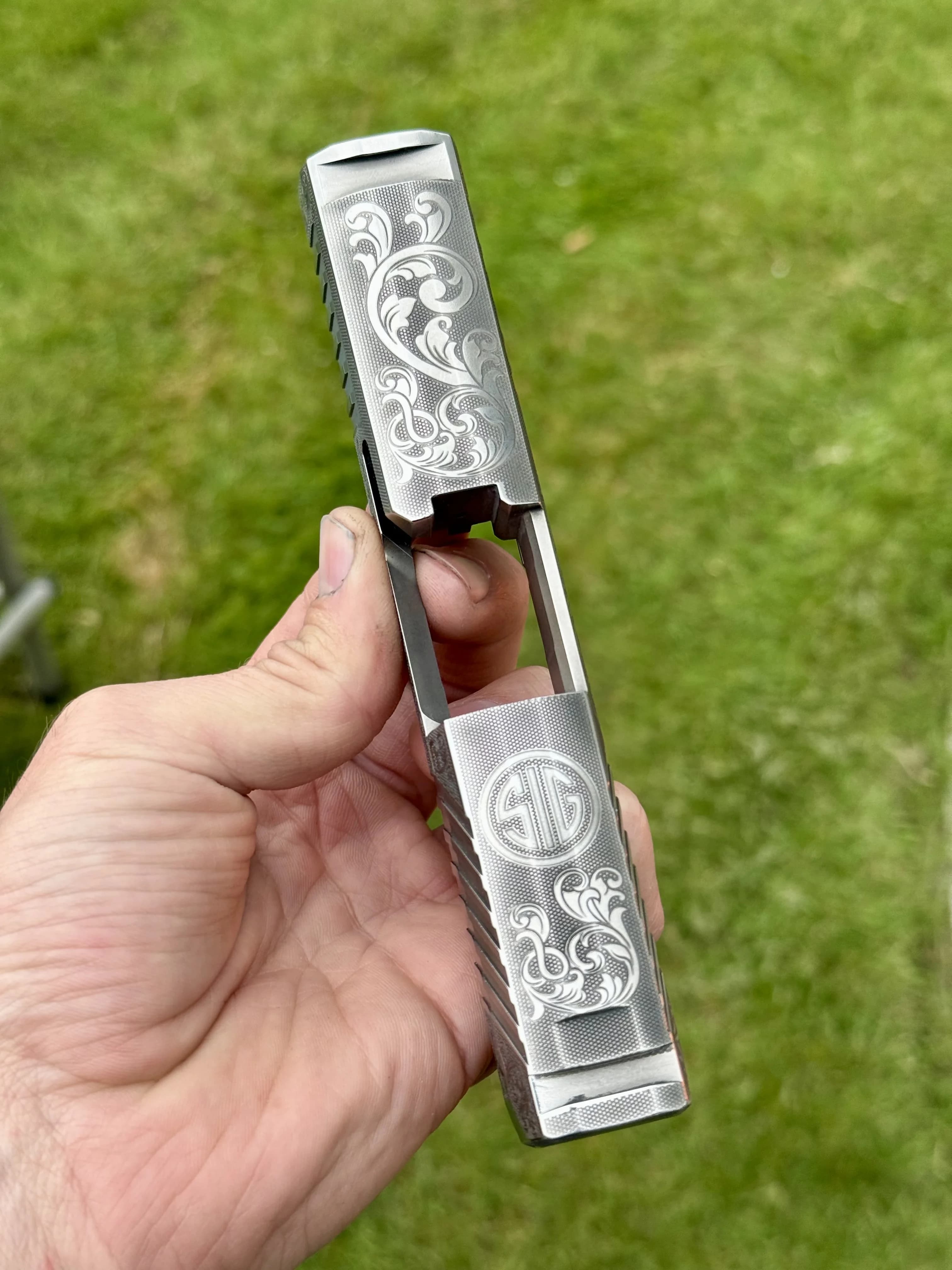 Custom engraved Glock slide with nickel plating premium finish