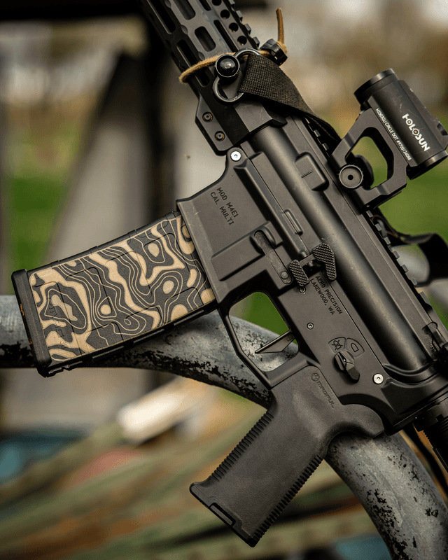 Detailed view of topography laser engraving on Magpul 30 round magazine
