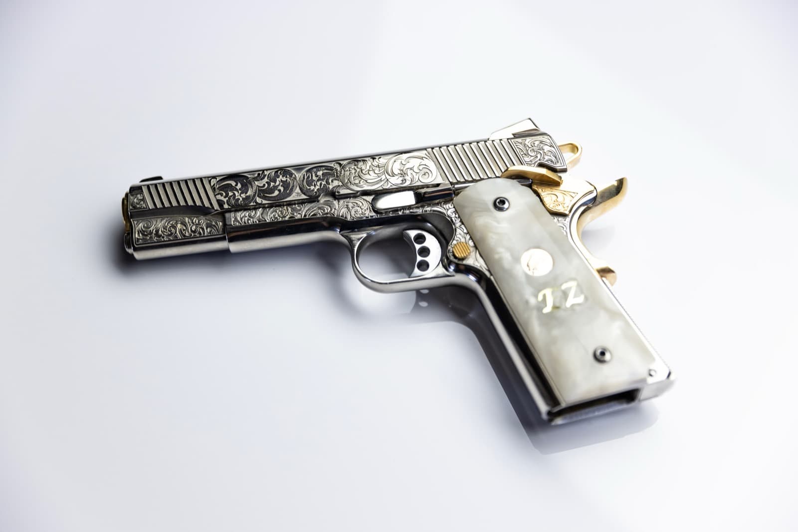 Nickel & 24k gold 1911 with pearl grips