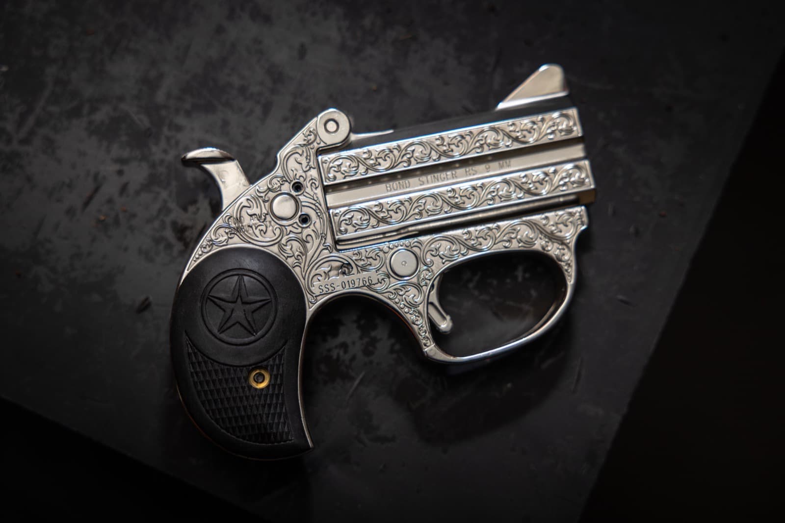 Nickel finish scrollwork — Derringer