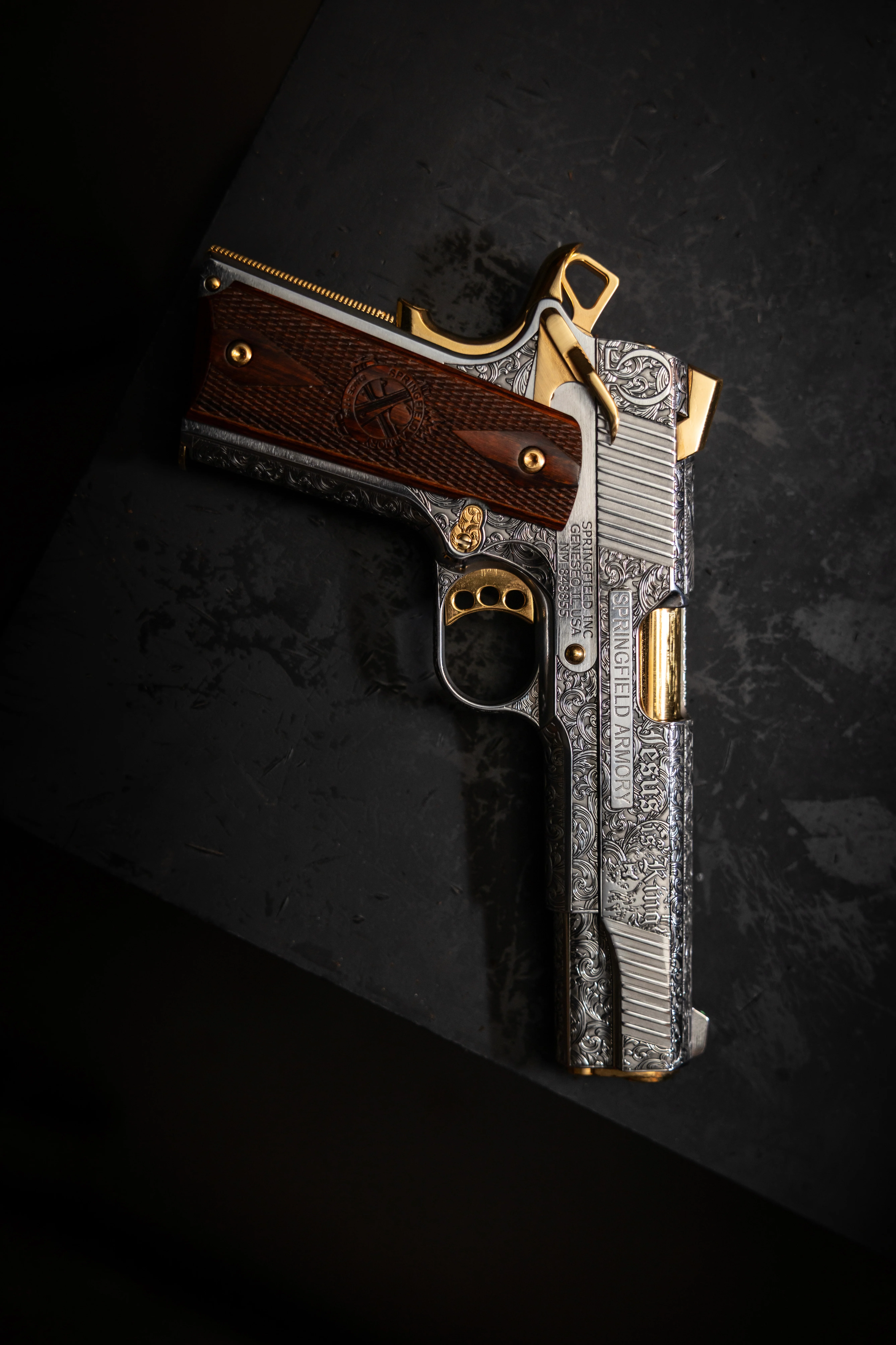 Jesus is King Springfield 1911 full profile on dark marble